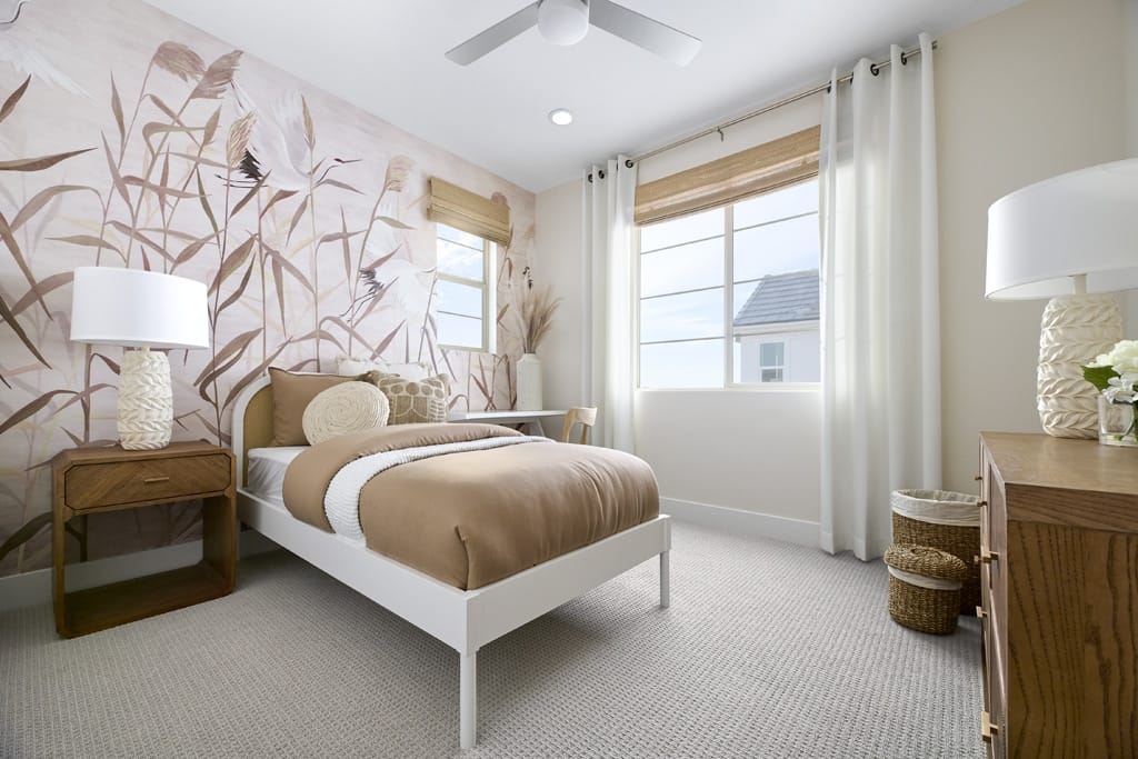 A secondary bedroom staged as a child's room