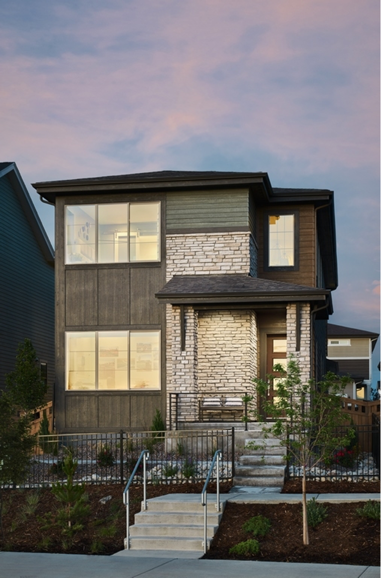 A vibrant single-family home in the Painted Prairie community by Berkeley Homes, featuring a unique rec room addition and innovative density solutions, captured by Eric Lucero Photography and NHTI.